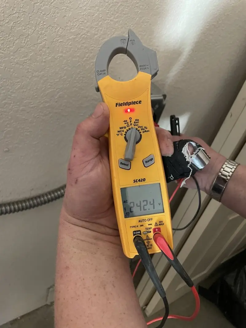 Voltage testing with clamp meter during Generator Installation in Mukilteo